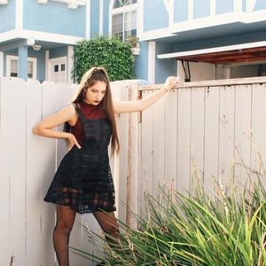 Sheer black skirt-overalls